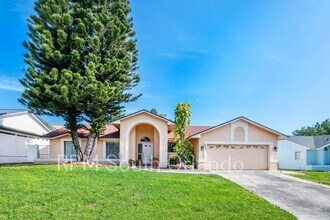 Building Photo - 4 Bedroom, 2 bathroom, 2 car garage, pool, backyard, close to Universal Studios and International...