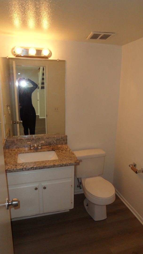 Building Photo - Two Story 4 BR 2.5 BA Condo With 2 Car Garage