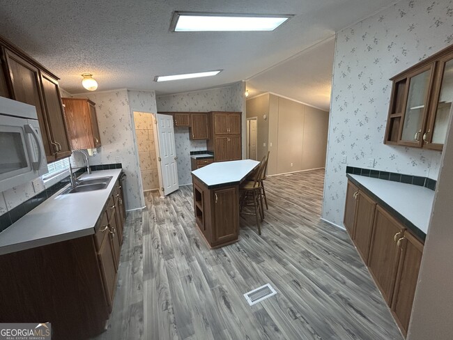 Building Photo - 6598 Jackson Trail Rd
