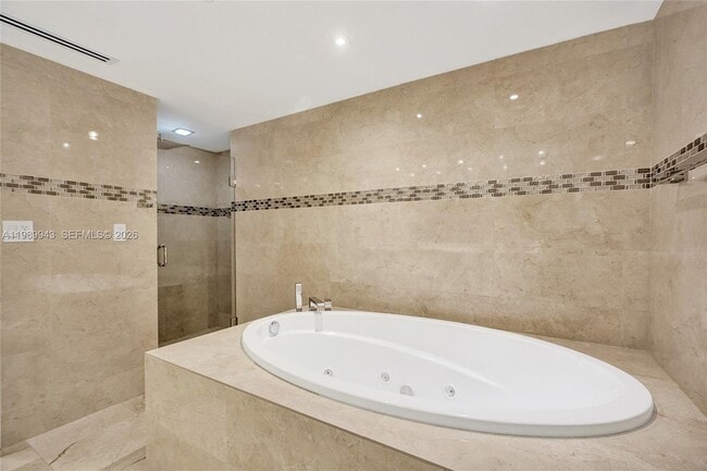 Building Photo - 10175 Collins Ave