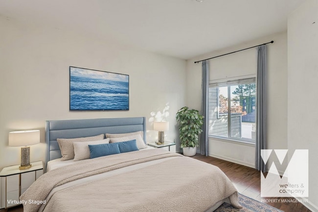 Building Photo - Light-Filled Corner Condo with Garage + Covered Parking in Gated Community