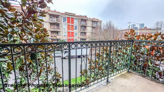 Building Photo - Sunny Capitol Hill 2 BR 1.5 BA Condo with Garage Parking Included & Skyline Views!