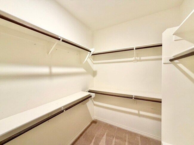 Building Photo - Move-In Ready 2 Bedroom 2.5 Bathroom Condo with LOFT & 2 Car Garage