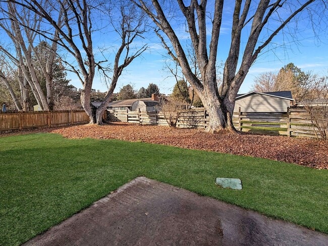 Building Photo - Renovated 4BR/2BA Boise Home – Modern Kitchen, Vaulted Ceilings & Fenced Backyard, Minutes to BSU...