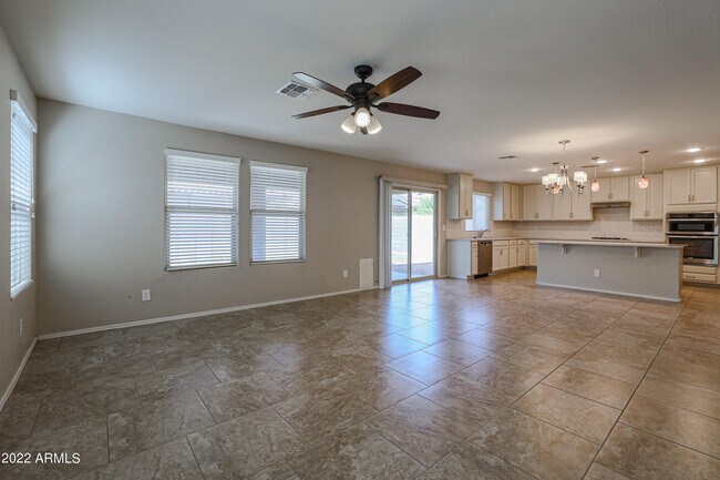 Building Photo - 12108 W Range Mule Dr