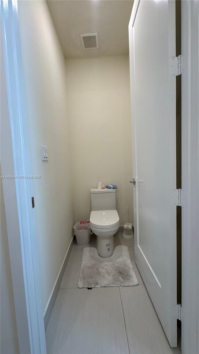 Building Photo - 6416 NW 102nd Ct