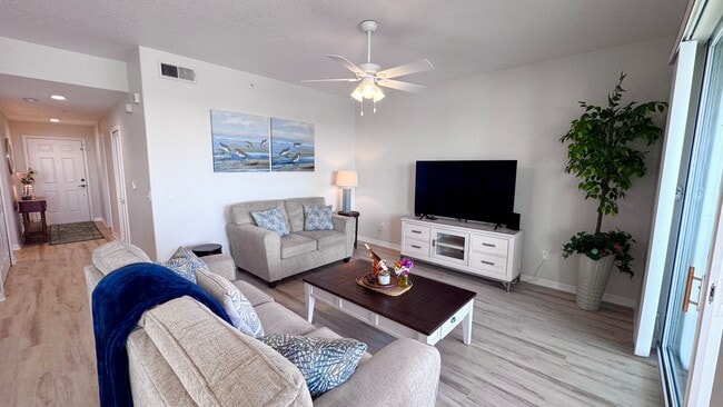 Building Photo - Elevated Luxury at The Terraces – 4th Floor Lake & Golf Course Views! 55+ Community!