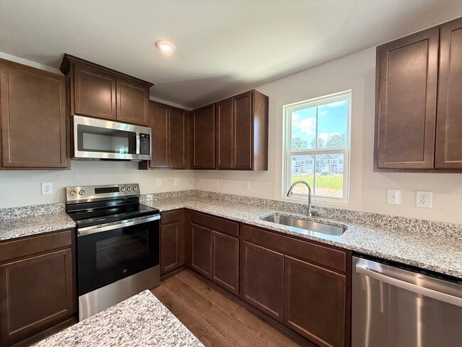 Building Photo - Modern 3-Bedroom Townhouse with Garage & P...