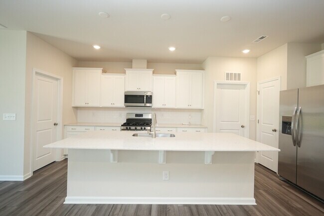 Building Photo - Spacious 4-Bedroom Home with Modern Comforts