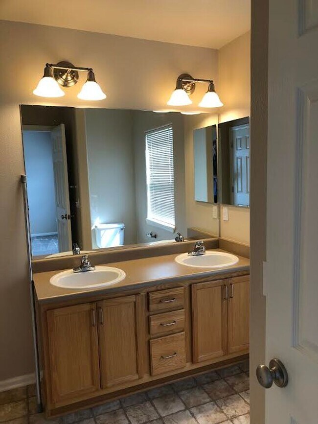 Building Photo - Fully Renovated, "MUST SEE" 3 Bedroom, 3 Bath Townhome with 2 Car Attached Garage