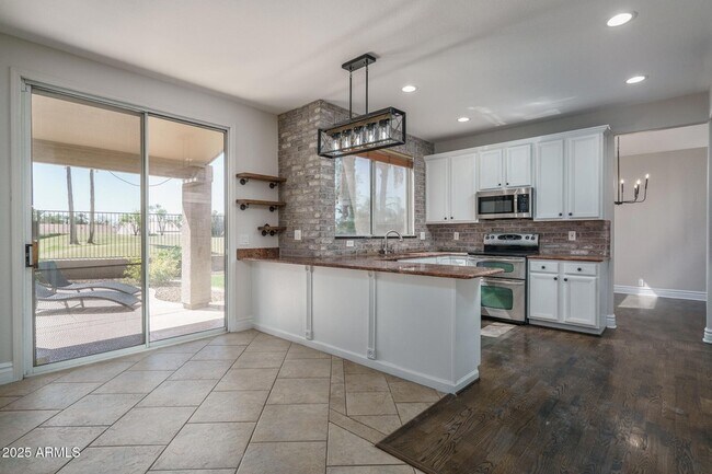 Building Photo - 5951 W Irma Ln