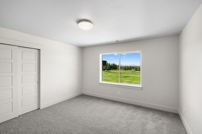 Building Photo - Lock-and-Leave Luxury Living — Lawn Care & Snow Removal Included!