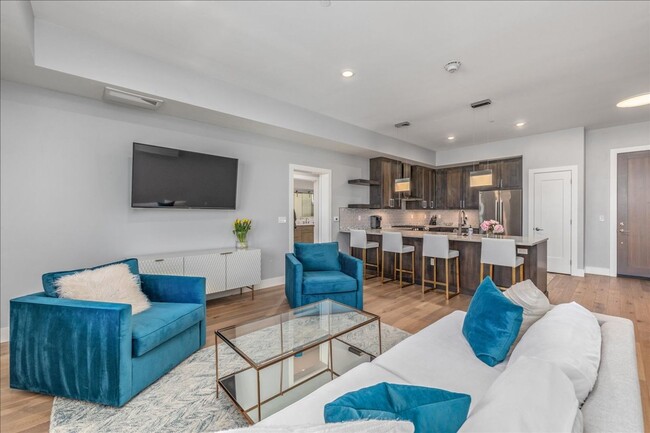 Building Photo - COME HOME TO REFINED DOWNTOWN LUXURY CONDO...