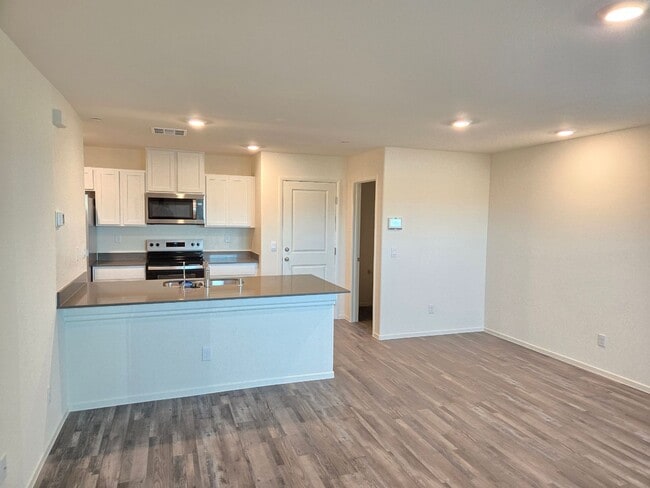 Building Photo - Kalea Trails Gated Cosmos Garden