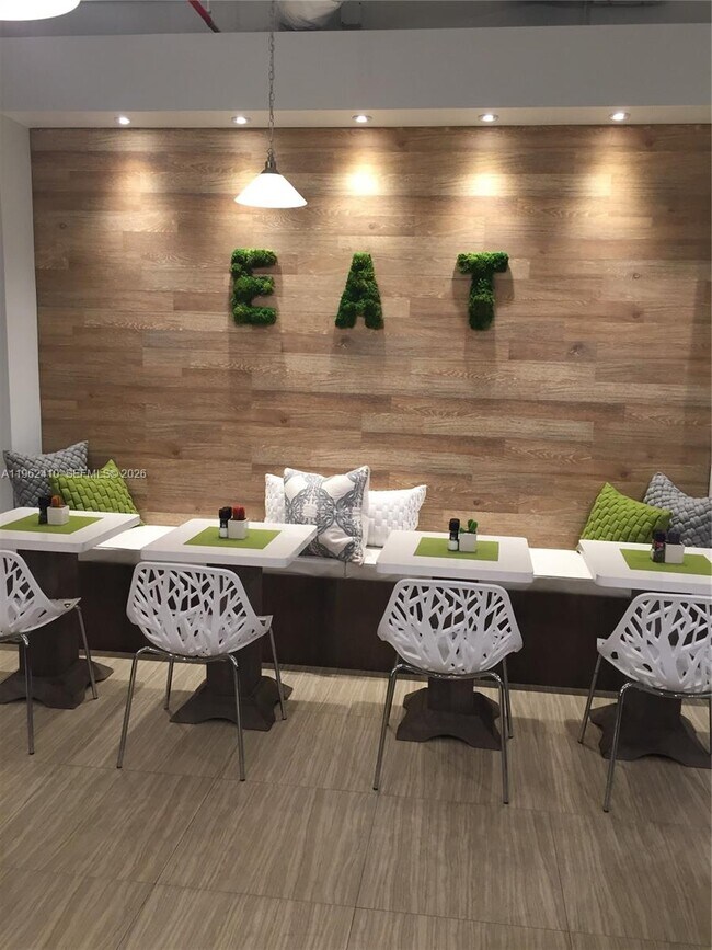 Building Photo - 10275 Collins Ave