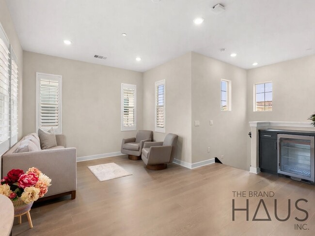 Building Photo - Rare 55+ Gated Travata Community – Bedrooms on Main + Loft + Resort-Style Amenities!