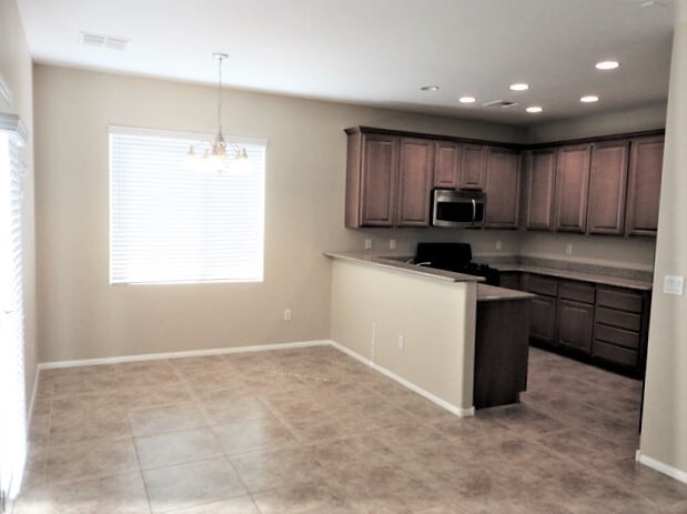 Building Photo - 681 Taliput Palm Pl