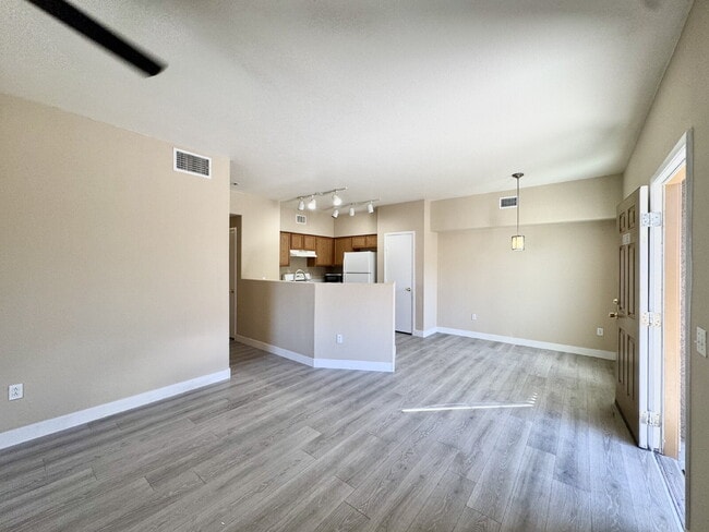 Building Photo - DOWNSTAIRS CONDO | GATED COMMUNITY | CENTENNIAL HILLS | UPDATED 3 BEDROOM