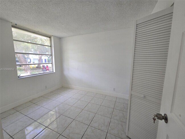 Building Photo - 8700 N Sherman Cir