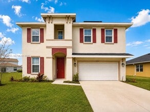 Building Photo - 10976 SW Tessili Wy