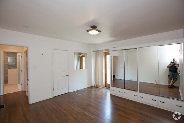 Master bedroom with two closets and French doors to back garden - 826 21st St