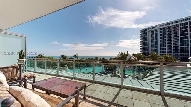 Building Photo - 10295 Collins Ave