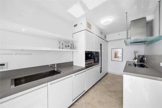 Building Photo - 4779 Collins Ave