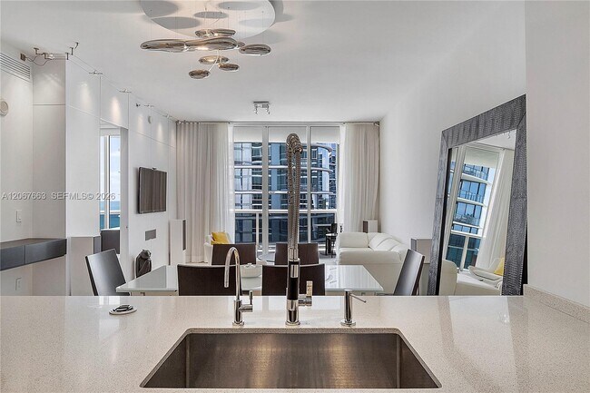 Building Photo - 15811 Collins Ave