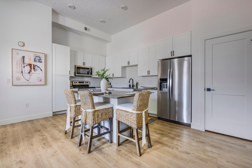 Kitchen with an Island - Aria Townhomes & Apartments