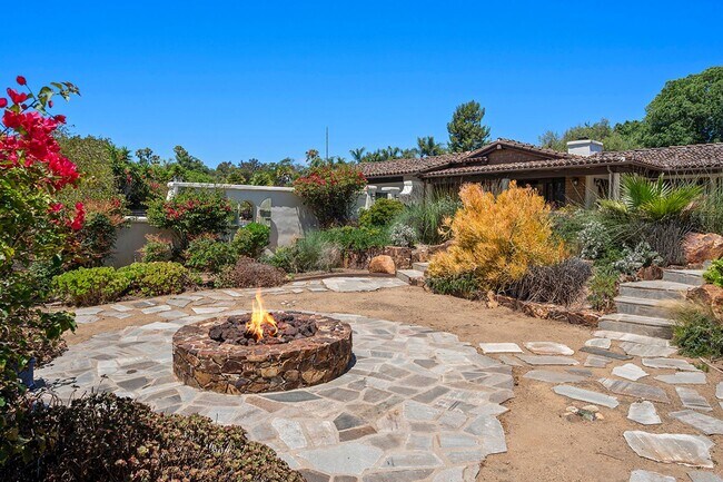 Building Photo - This Beautiful Hacienda Style Home combine...