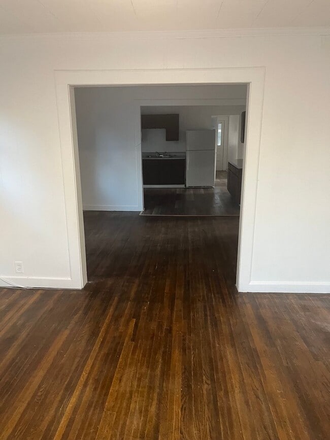 Building Photo - Large 4 bedroom 2 bathroom with huge privacy fenced back yard