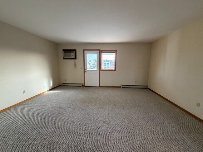 Building Photo - Two Bedroom Apartment - Upper Unit. Byron Center Schools!