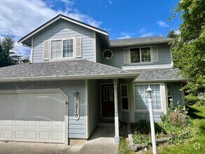 Building Photo - Spacious 4 BD + Den