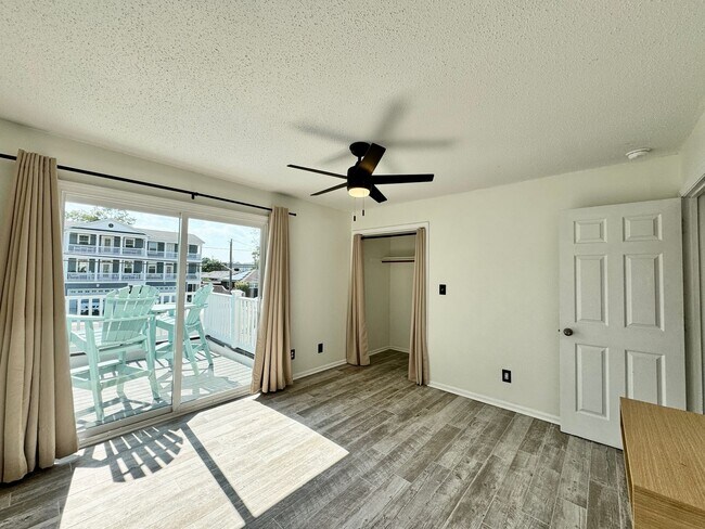 Building Photo - Ready NOW! A Custom Townhouse-Style Duplex Blocks to the Beaches! Fenced Yard - Hot Tub - Pet Fri...