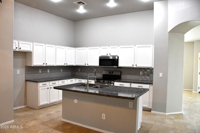 Building Photo - 8787 W Gardenia Ave