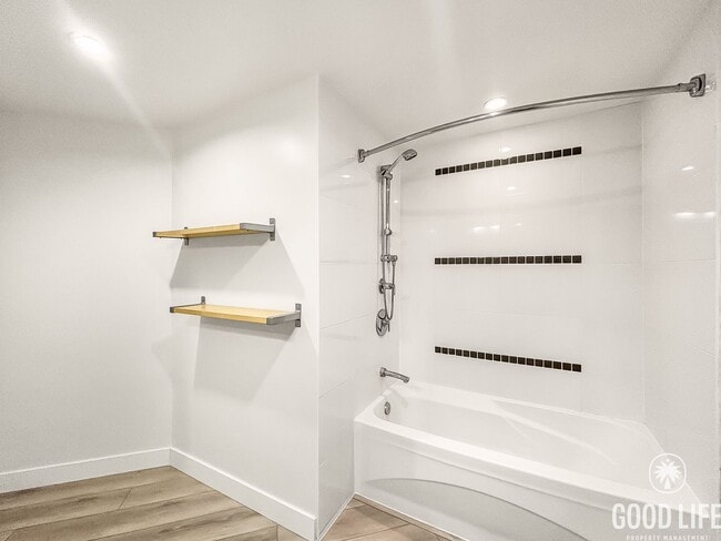 Building Photo - Stunning 2BD/2BA Condo in Downtown W/ W/D, High Ceilings, Community Pool, Spa, & Fitness Center!