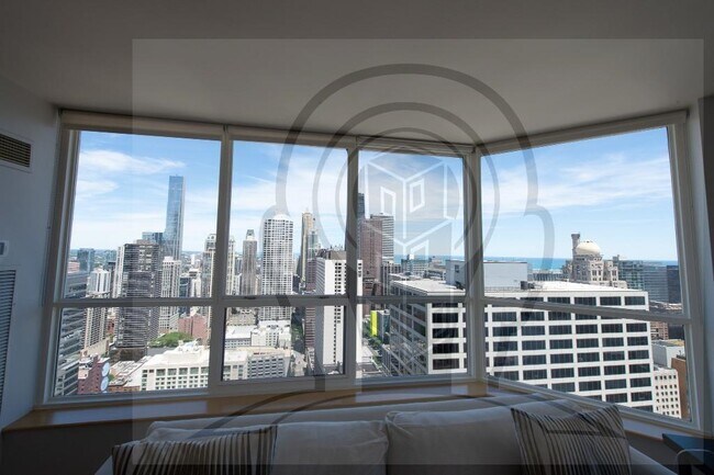 Building Photo - Stunning 46th Floor, 2 bedroom condo, right on the Chicago River