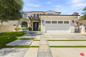 Building Photo - 5017 Hesperia Ave