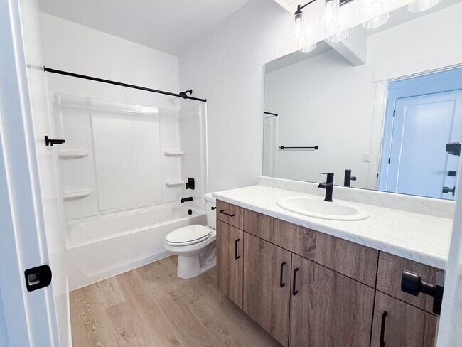 Building Photo - Spacious Family Home with Modern Upgrades