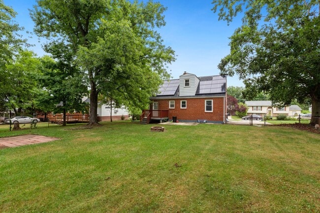Building Photo - Move-In Ready Cape Cod with 3 Finished Levels & Huge Backyard