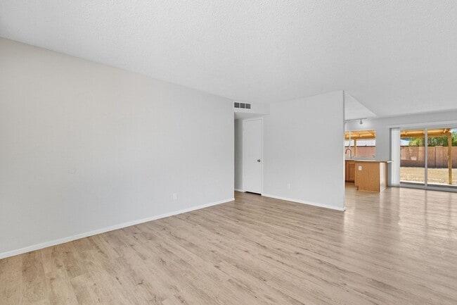 Building Photo - Three bedrooms plus big garage!