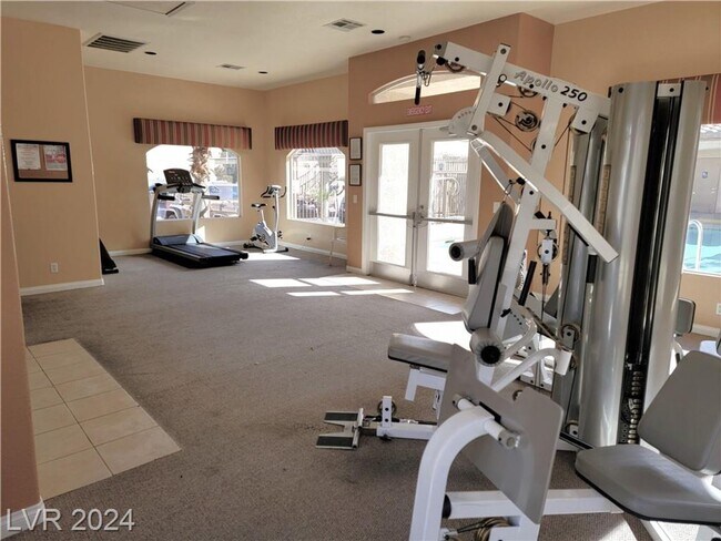 Building Photo - SECOND-FLOOR UNIT IN A GATED SOUTHWEST COM...