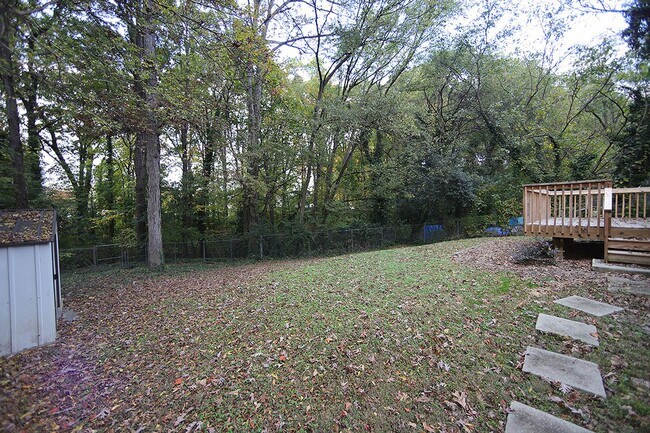 Building Photo - Charming and Cozy 3-Bedroom Racnh Home in Prime Raleigh Location with FENCED BACKYARD!!