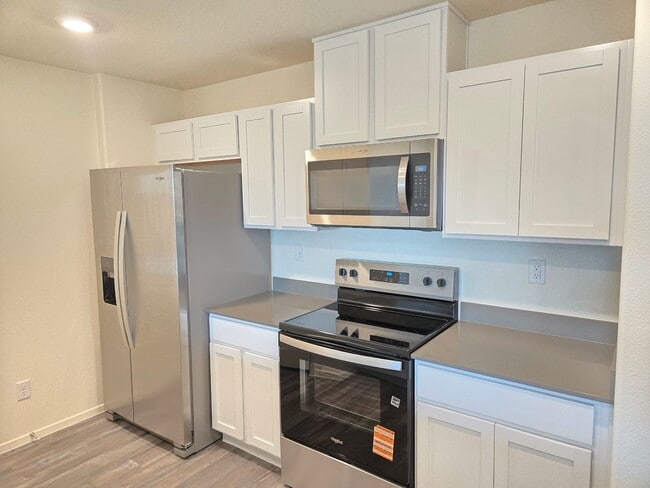 Building Photo - Kalea Trails Gated Cosmos Garden