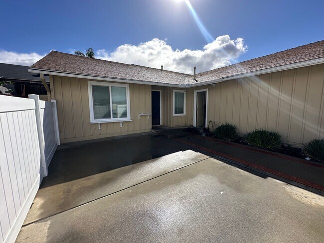 Building Photo - Remodeled 4 bedroom with central A/C and 2 car garage!