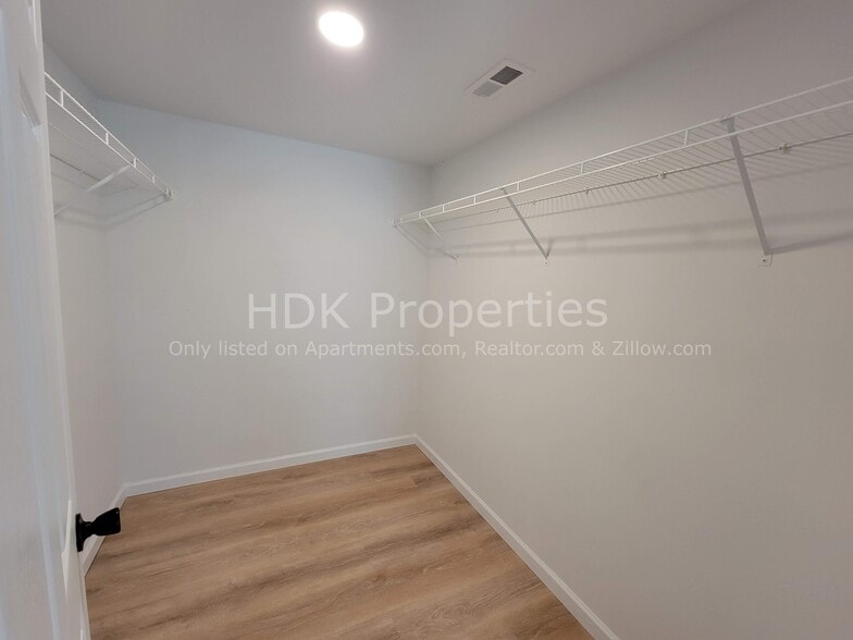 Primary bedroom walk in closet - 1566 Sugar Grove Rd