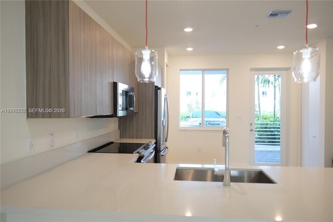 Building Photo - 6416 NW 102nd Ct