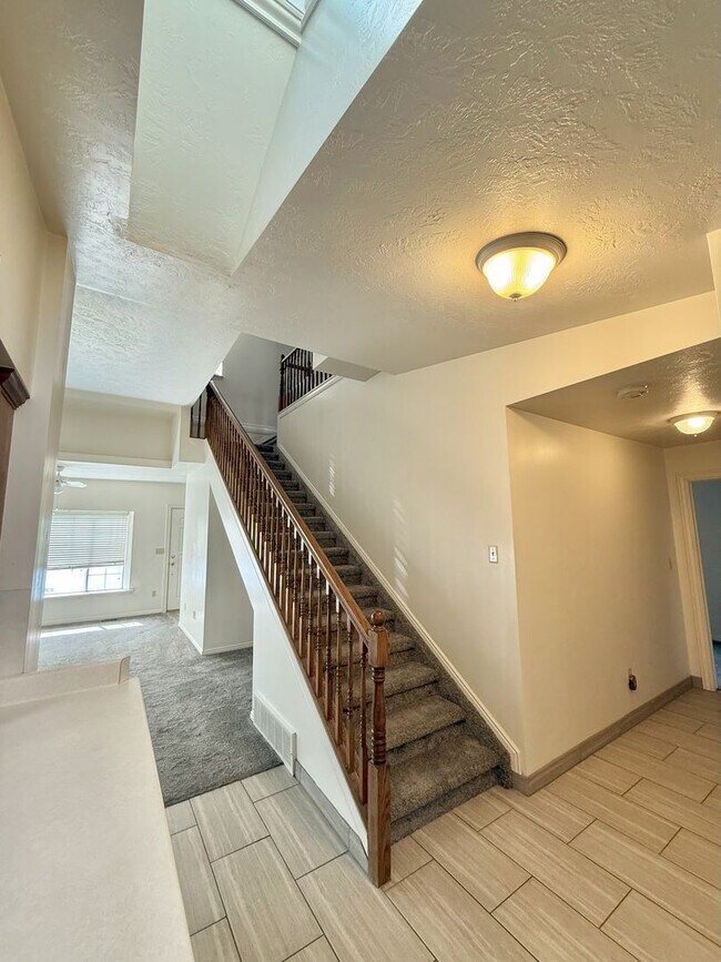 Building Photo - Timeless Charm, Modern Living — 4-Bed Gem ...