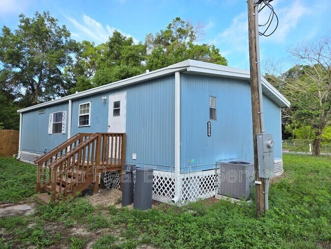Building Photo - 8628 Adonis Rd