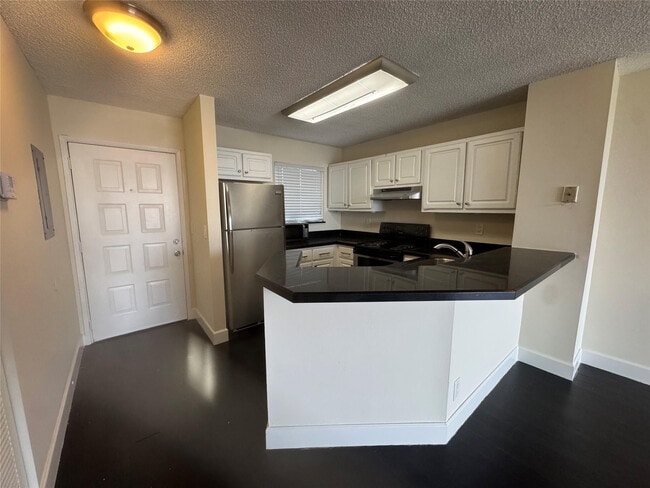 Building Photo - 8750 N Sherman Cir